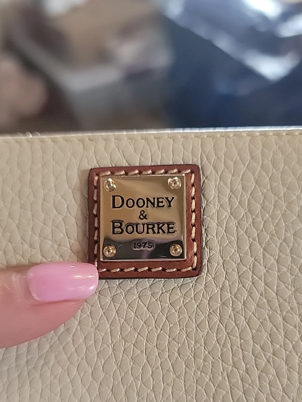 Dooney & Bourke  Pebbled Leather Zip-Around Wallet In Bone